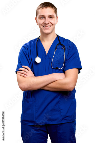 Happy doctor smiling at camera on white background