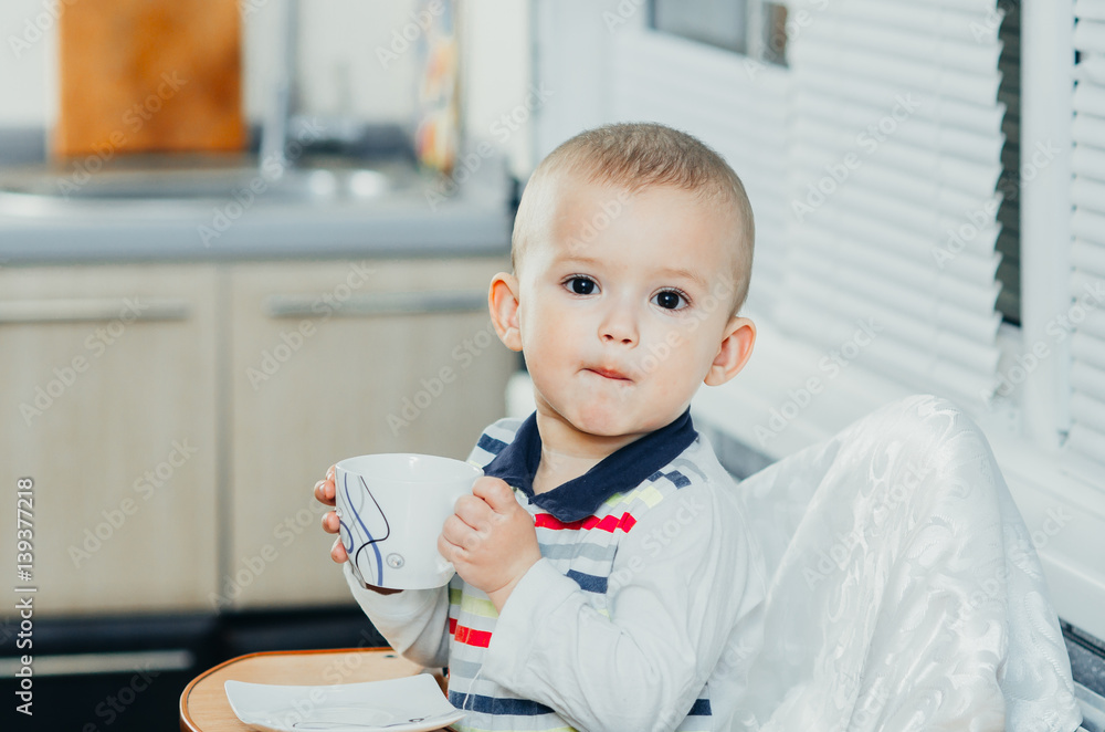 child drinking tea child drinking tea