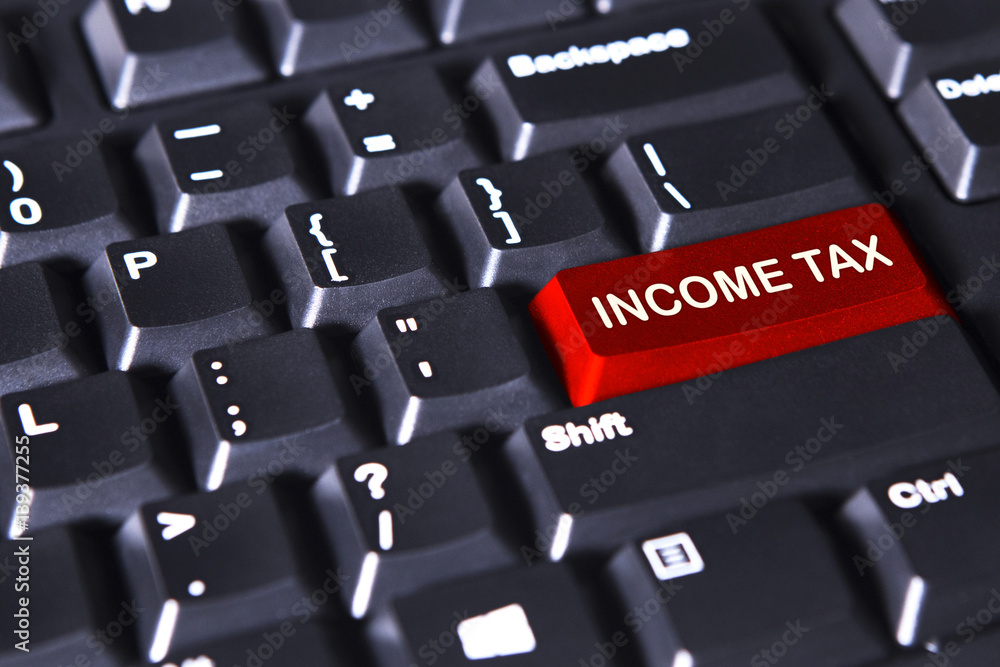 Keyboard with text of income tax Keyboard with text of income tax