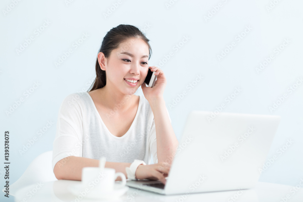 young pretty woman using laptop in office young pretty woman using laptop in office