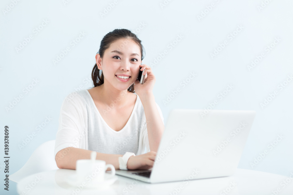 young pretty woman using laptop in office young pretty woman using laptop in office