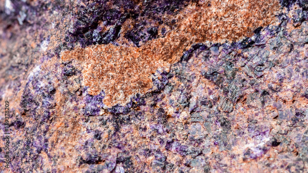 Rock stone with violet and brown tint textures, selective focus. For background , backdrop, substrate, composition use. Rock stone with violet and brown tint textures, selective focus. For background , backdrop, substrate, composition use.