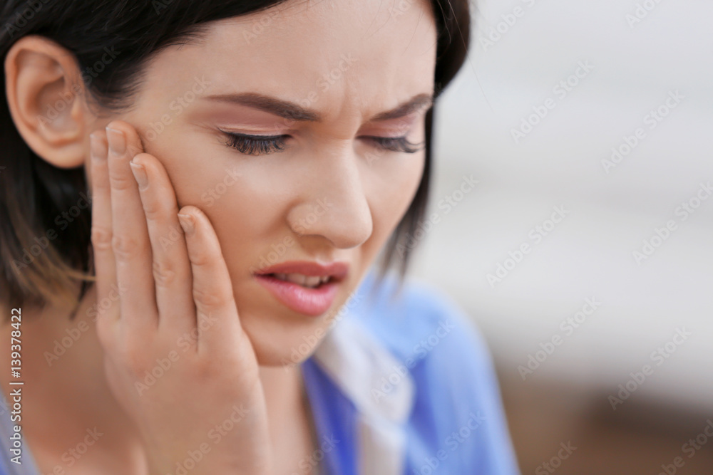 Beautiful young woman suffering from toothache, close up Beautiful young woman suffering from toothache, close up