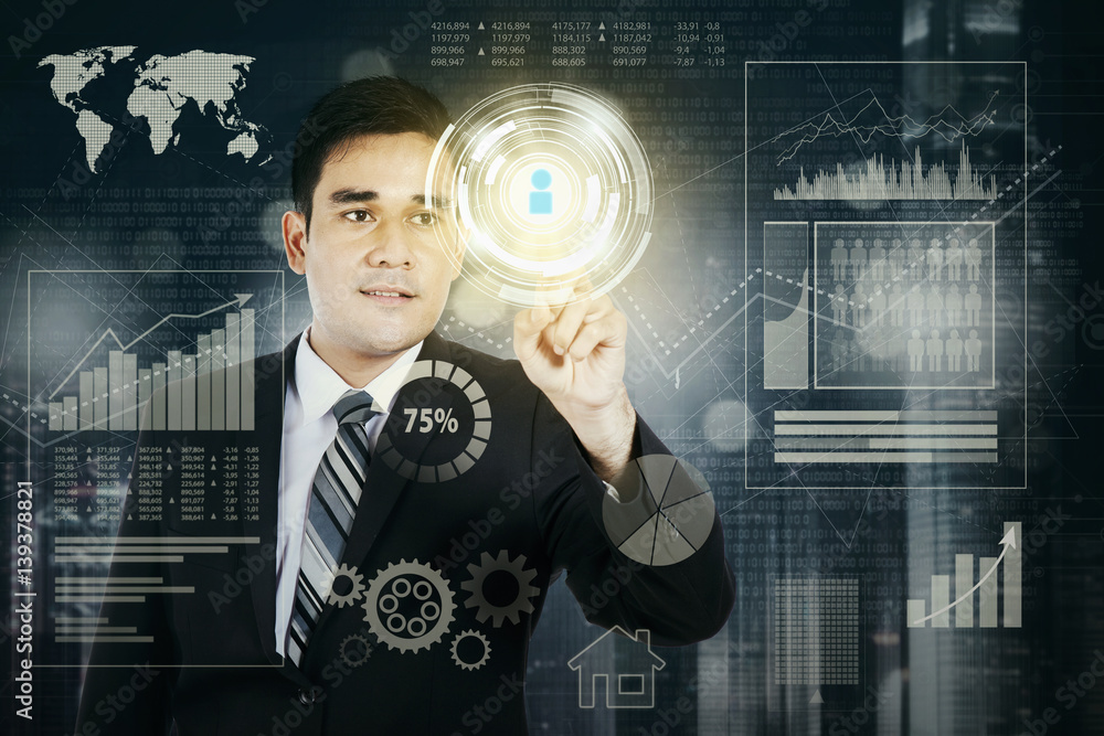 Successful businessman using virtual screen Successful businessman using virtual screen