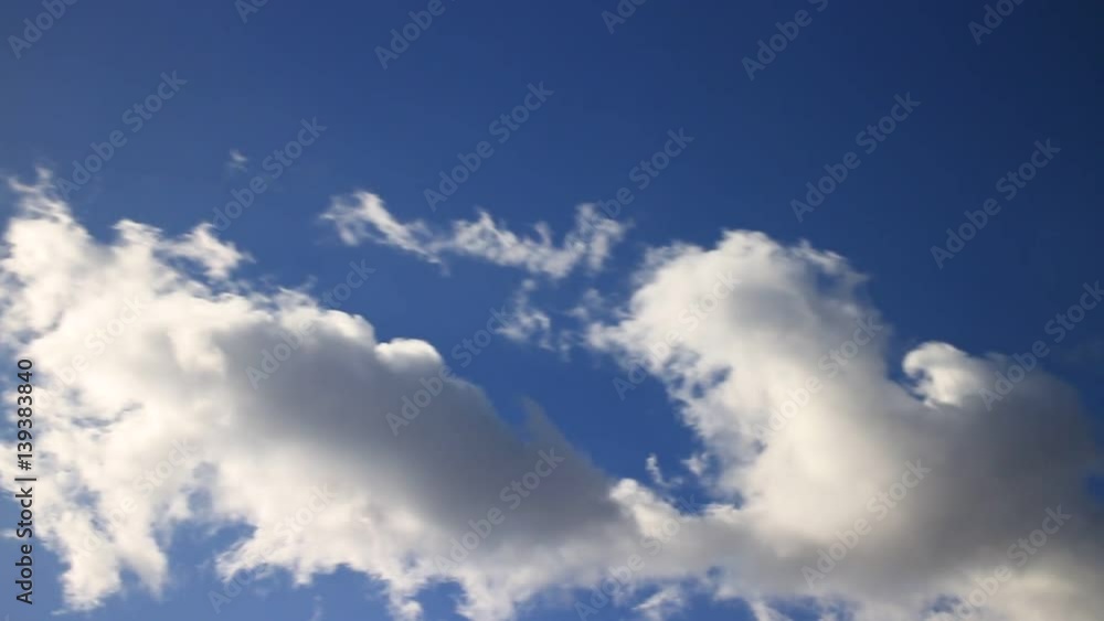 Skyscape or cloudscape. Clouds on the blue sky at the sunny day. Weather. Time lapse. full hd Skyscape or cloudscape. Clouds on the blue sky at the sunny day. Weather. Time lapse. full hd