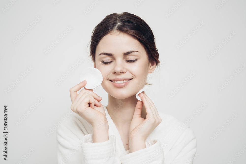 pretty woman with closed eyes and two wadded wheels pretty woman with closed eyes and two wadded wheels