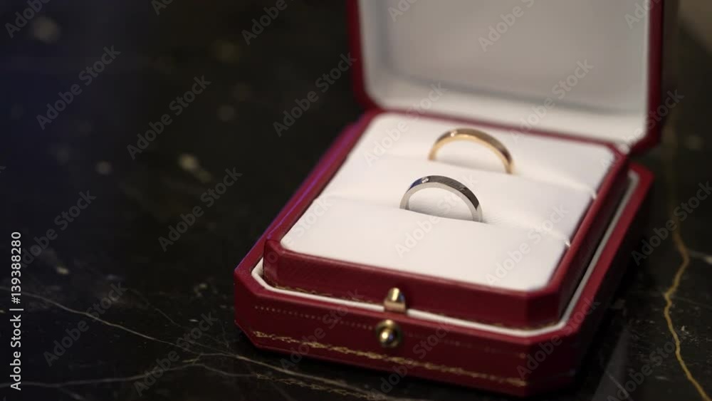 Two rings in a jewelry red box Two rings in a jewelry red box