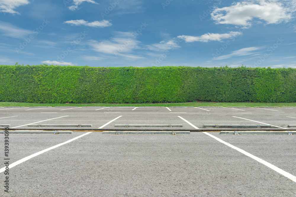 Empty parking lot on blue sky background