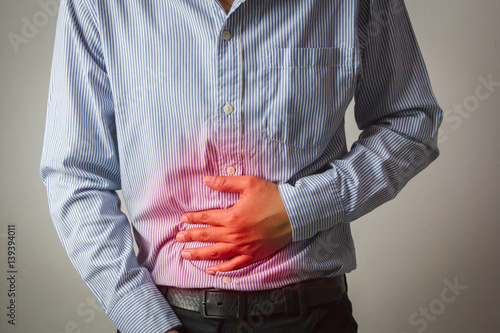 Male stomachache or Gastroenterologists / Concept with Healthcare And Medicine. photo