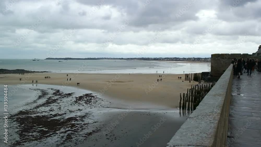 view of beach of Saint-Malo,walled port city in Brittany in northwestern France on English Channel view of beach of Saint-Malo,walled port city in Brittany in northwestern France on English Channel