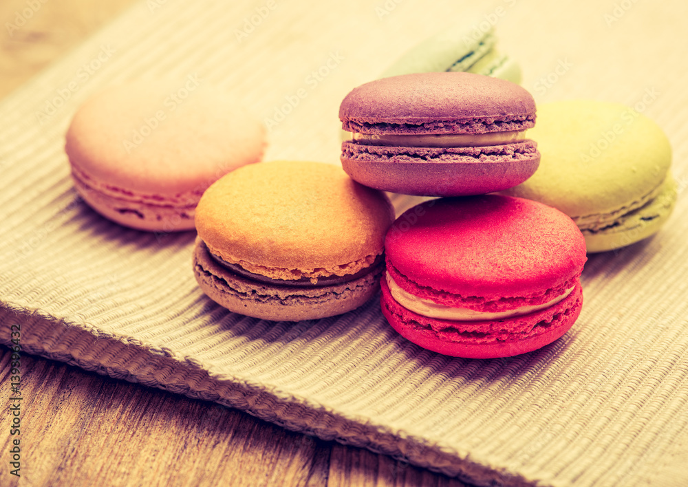 colorful macarons on Napery background colorful macarons on Napery background