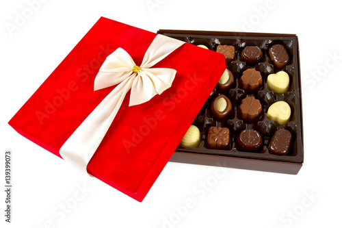 assorted chocolates in a box isolated on white