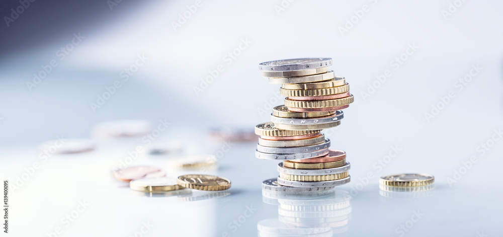 Euro coins. Euro money. Euro currency.Coins stacked on each other in different positions. Money concept.
