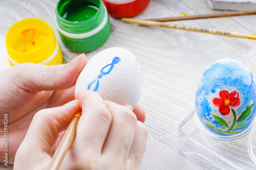 Easter egg painting with acrylic paints