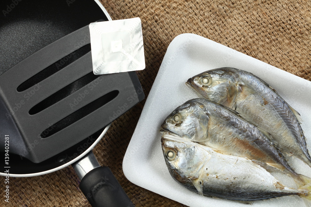 The short bodied mackerel fish put on the food grade foam tray among ...