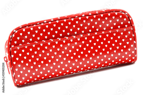 red cosmetic bag with white hearts