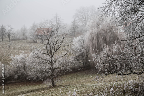 Idyllische weststeirische Landschaft im Winter photo