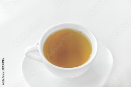 filiżanka herbaty na białym tle