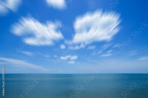 Motion of white cloud over the sea.