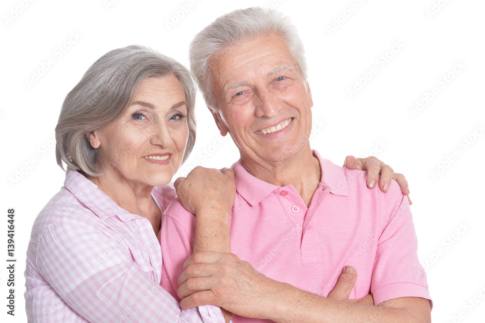 Happy elderly couple embracing