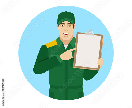 Man in uniform pointing the finger to clipboard