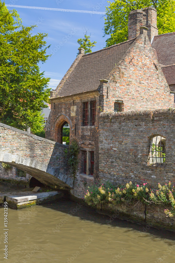 Famous medieval St Bonifacius Bridge in historic center of Bruges.(Belgium). Vertically. 