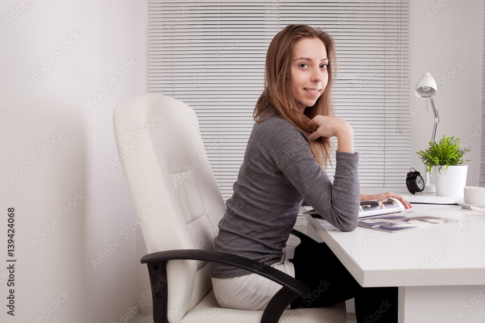Pretty business woman at office desk Pretty business woman at office desk