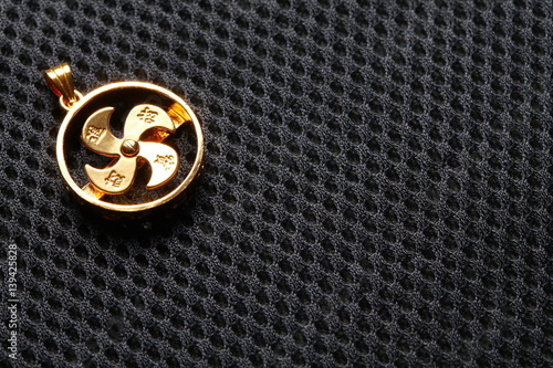 Photography A golden fan bladed wheel of fortune represent faithful and religion believe