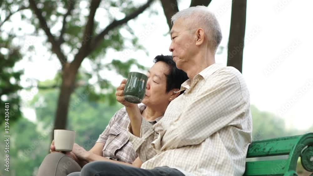 Slow motion tired and worry senior couple sitting, drinking coffee. Life after retirement, financial and future planning Slow motion tired and worry senior couple sitting, drinking coffee. Life after retirement, financial and future planning