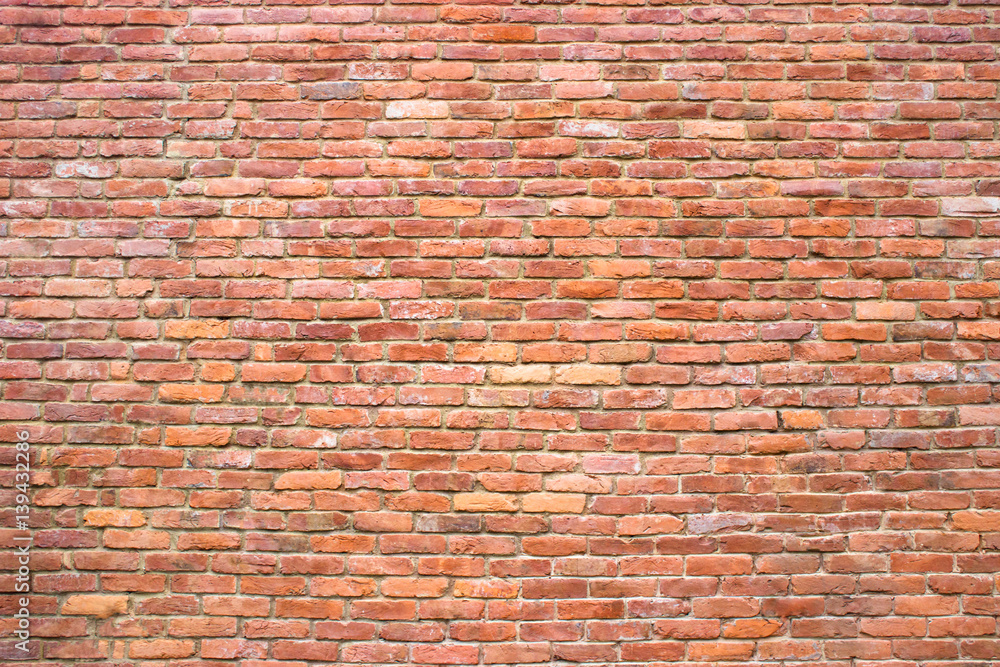 Obraz premium Antique brick wall texture stone facade of the building