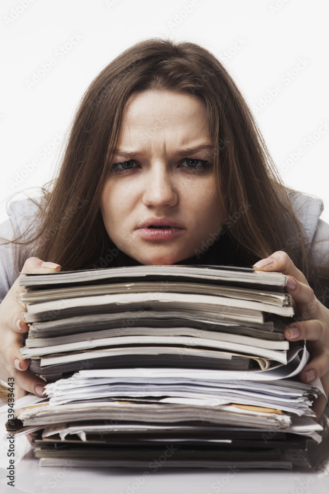 Businesswoman in problems. Alone working in office with a lot of documents. Yelling and screaming for bad results. (psychological portrait, aggression, anger, frustration) Businesswoman in problems. Alone working in office with a lot of documents. Yelling and screaming for bad results. (psychological portrait, aggression, anger, frustration)