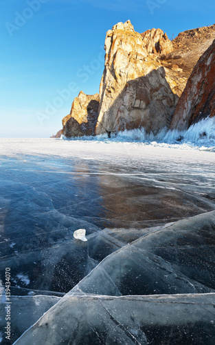 Lake Baikal. Olkhon Island. Rocks of Cape Sagan-Khushun at winter sunset