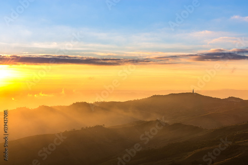 sunrise on multi layer of high mountain