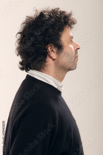 Adult man with curly hair