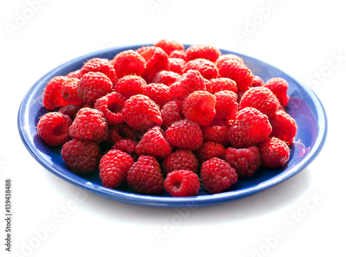 Big Pile of Fresh Raspberries isolated on White Background 