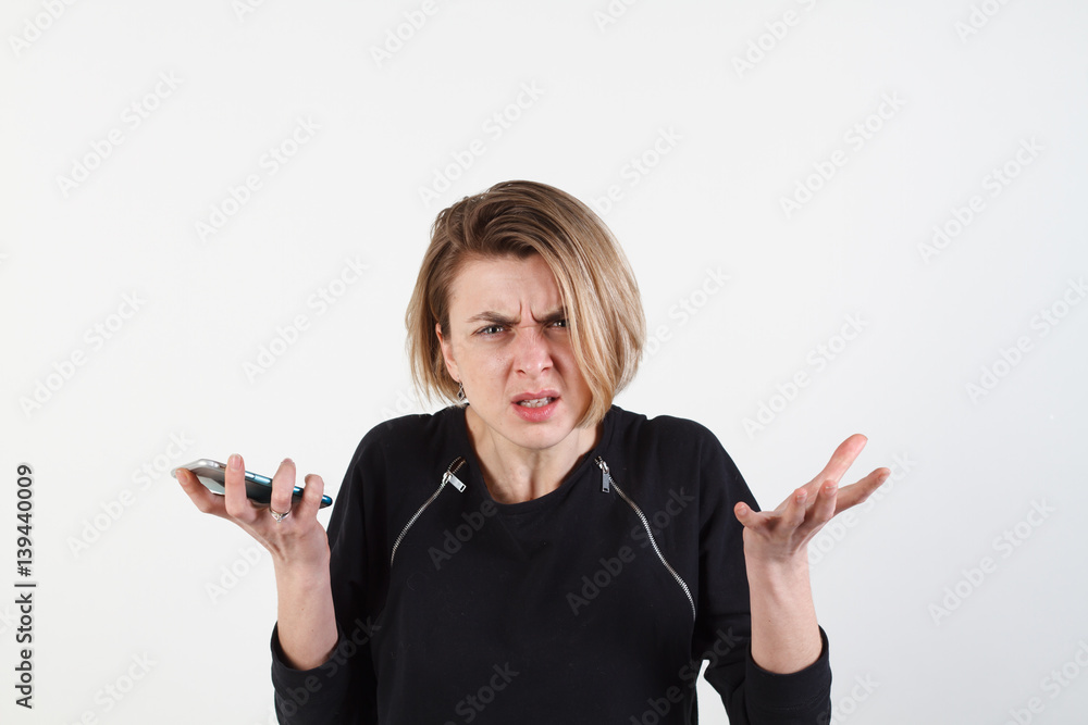 Obraz premium Business woman texting on her cell phone isolated