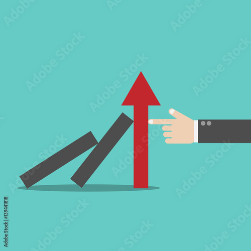 Successful strong confident businessman stopping domino effect.