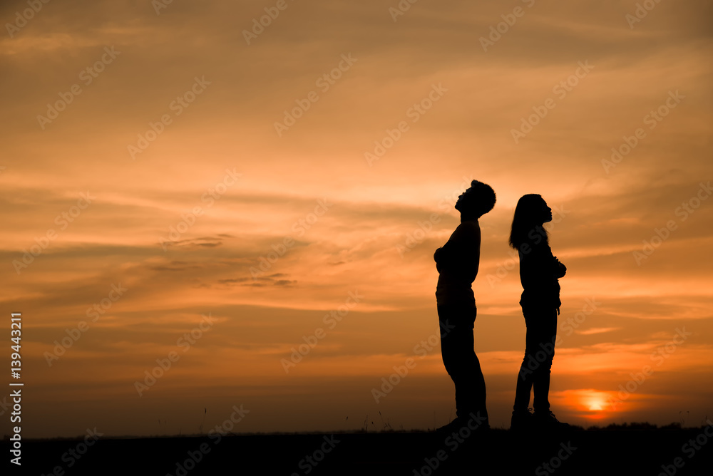 Silhouette Of Asian Couple Back To Back And Thinking, Full Length