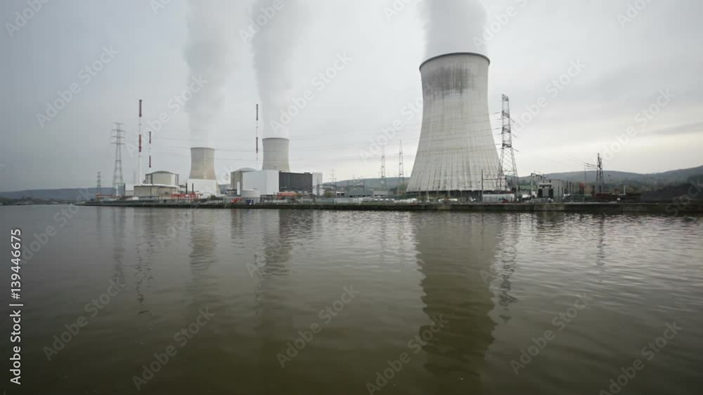 Gray and dark sequence of a large nuclear power plant on an overcast day Gray and dark sequence of a large nuclear power plant on an overcast day