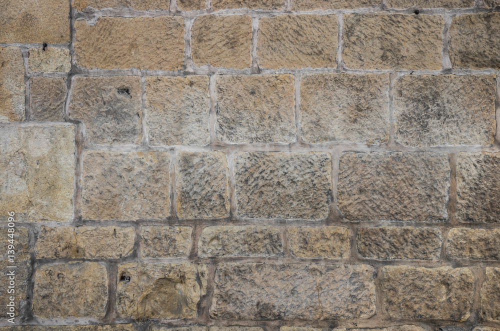 Fototapeta premium Sandstone stone wall background