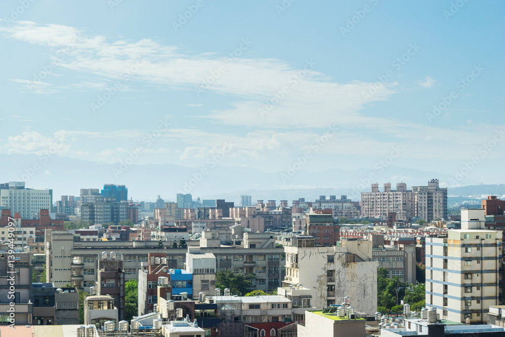 Business and culture concept - panoramic modern city skyline bird eye aerial view under dramatic morning blue cloudy sky in Taiwan