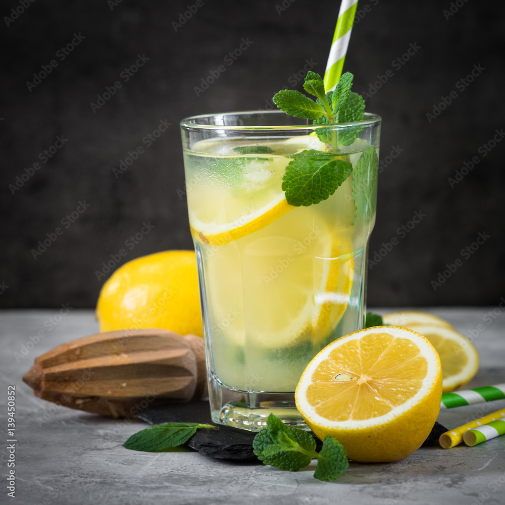 Fototapeta premium Lemonade Traditional Summer drink. Citrus infused water