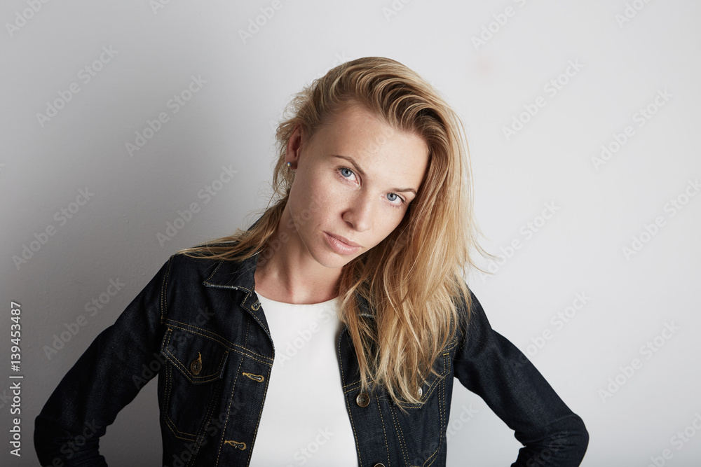 Portrait of beautiful woman smiling. Posing infront of empty background. Portrait of beautiful woman smiling. Posing infront of empty background.