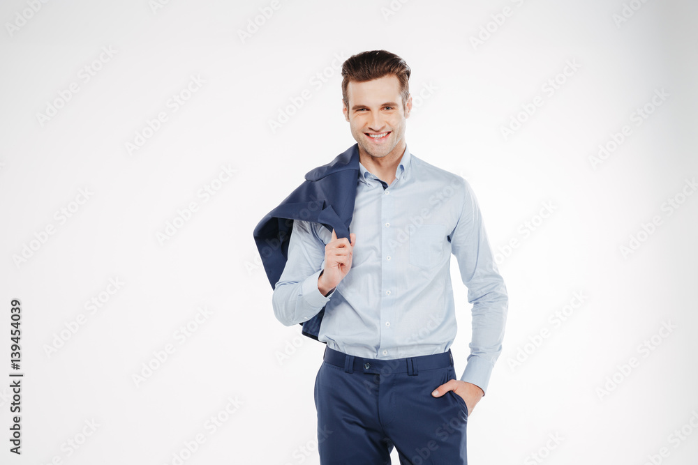 Man in shirt with arm in pocket Man in shirt with arm in pocket