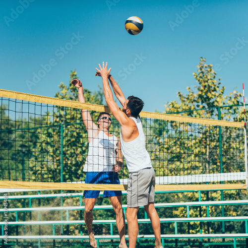 Beach volleyball Players on Net