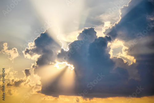 Canvas Print the clouds in the sky and the rays of the sun