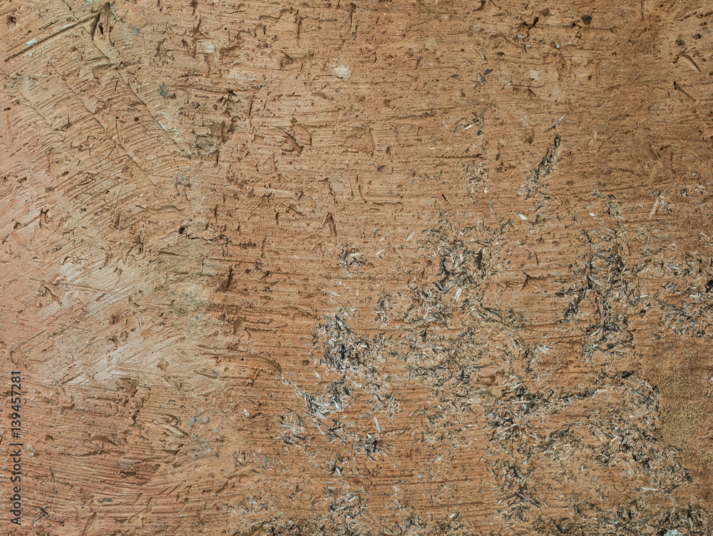 Closeup brown rough clay wall Closeup brown rough clay wall