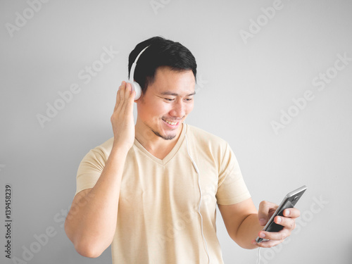 Man listens to happy music. © Sevendeman