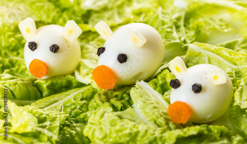 little pigs of quail eggs with lettuce © AllFOOD