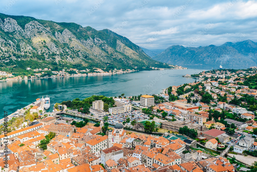 Panoramic view of port, town and mountains in Kotor, Montenegro